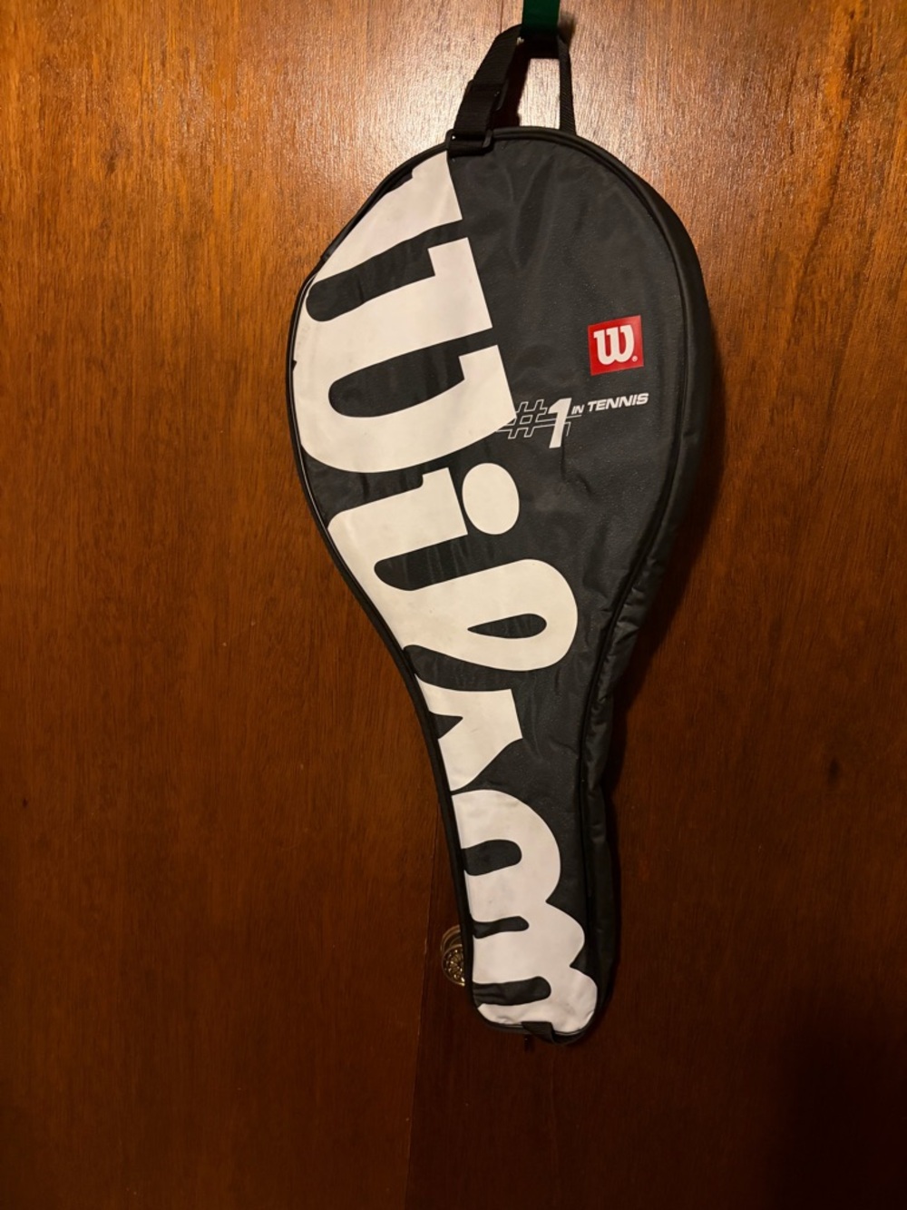 Wilson Black Tennis Racket Cover with White Logo and Red Emblem
